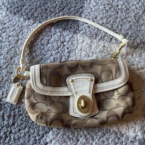 Coach classic wristlet with front pocket